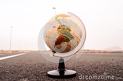 Globe Earth on an Asphalt Street Stock Photo