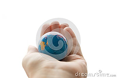 Globe in human palm Stock Photo