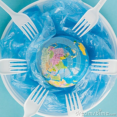 Globe on a plastic plate. The concept of ecology, land conservation Stock Photo