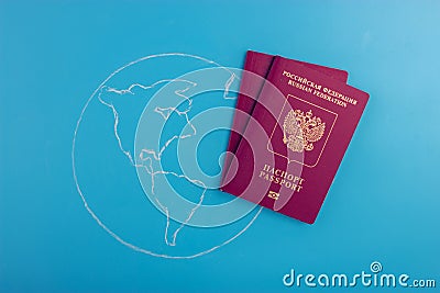 Globe and Russian passport, close-up Stock Photo