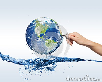 Globe with water and hand with the key Stock Photo