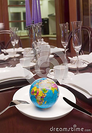 Globe in white dish Stock Photo