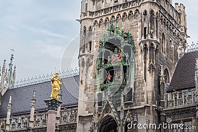 Glockenspiel clock of New Town Hall Neues Rathaus Tower and MariensÃ¤ule Column - Munich, Bavaria, Germany Stock Photo