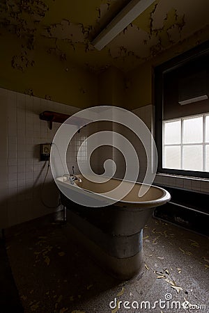 Derelict Hydrotherapy Bathtub - Abandoned Laurelton State Hospital - Pennsylvania Stock Photo