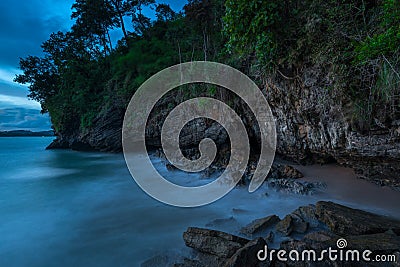 A gloomy seascape - the shore, rocks Stock Photo