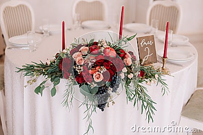 Glorious autumn bouquet on guest wedding table Stock Photo