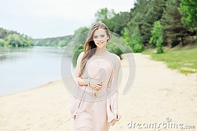 Glorious young woman in white dress Stock Photo