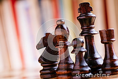 Glossy Black Wooden Chess Pieces on Board Stock Photo