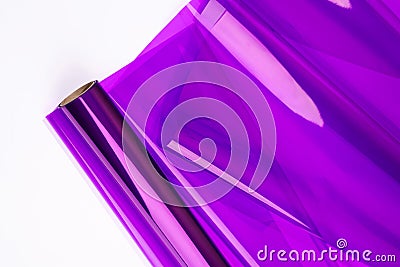 Glossy purple wrapping paper for gifts or flowers on white background. Top view Stock Photo