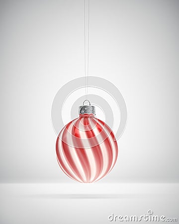 Glossy red and white twisted striped Christmas bauble Stock Photo