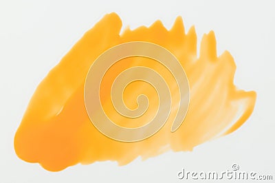 Glossy yellow paint stain isolated Stock Photo