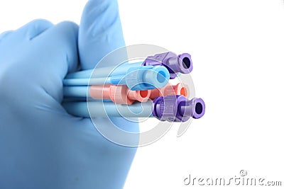 Gloved hand holding surgical introducers Stock Photo