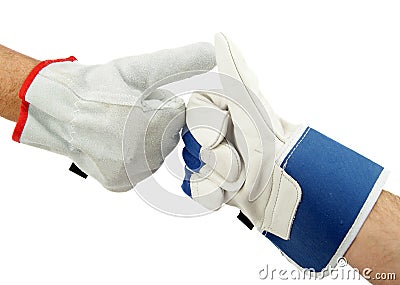 Gloved hand signaling thumb up. Stock Photo