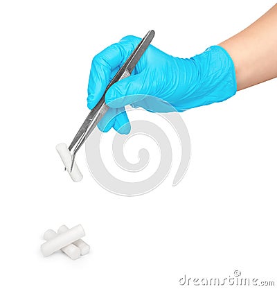 Gloved hand takes tweezers sterile cotton swab Stock Photo
