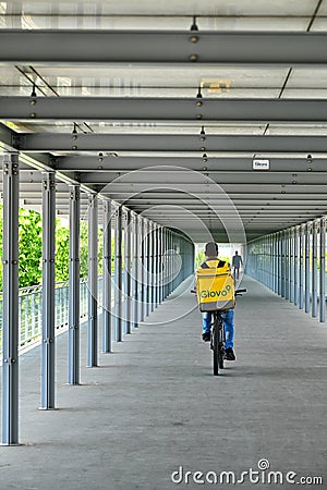 Glovo delivery biker in urban contest Editorial Stock Photo