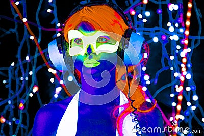 Glow uv neon disco female cyber doll Stock Photo