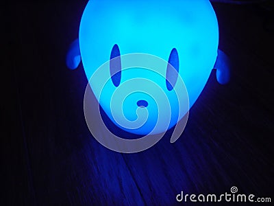 Glowing Blue Alien Stock Photo