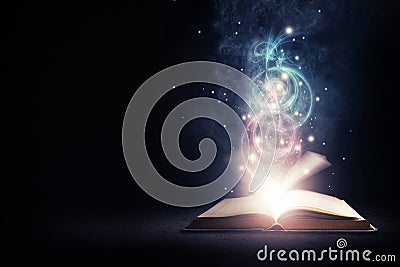 Glowing Book with colors Stock Photo