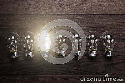Glowing bulb uniqueness concept Stock Photo