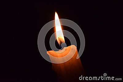 Glowing candle Stock Photo