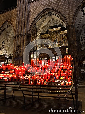 Glowing candles in cathedral Editorial Stock Photo