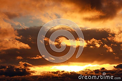 Glowing dramatic sunset clouds in sky, nature background Stock Photo
