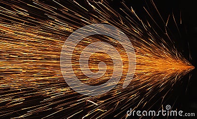 Glowing flow of sparks in the dark. Process of working with metal. Splatter Stock Photo