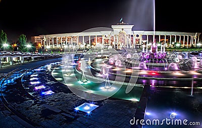 Glowing Fountain in Almaty at night Stock Photo
