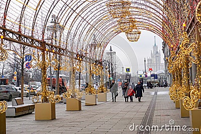 Glowing gold Christmas arch in the daytime in MOSCOW Editorial Stock Photo