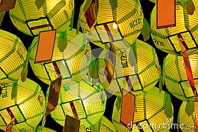 Glowing green lanterns on Buddha's birthday in night Stock Photo