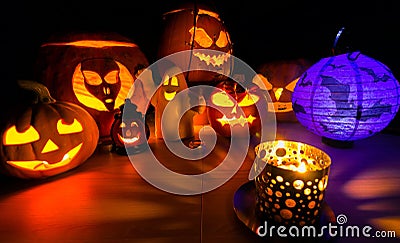 Glowing Halloween pumpkin, warm candle light, autumn holiday background, traditional jack-o-lantern Stock Photo