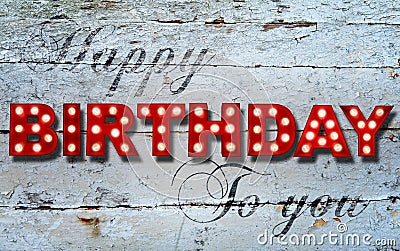 Glowing Happy Birthday on wooden background Stock Photo