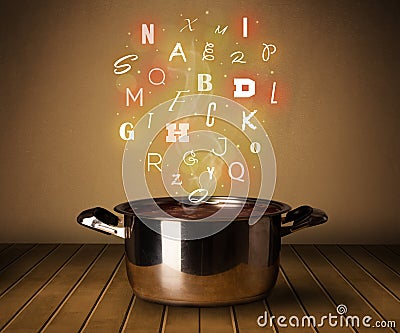 Glowing letters coming out from cooking pot Stock Photo