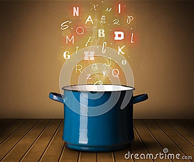 Glowing letters coming out from cooking pot Stock Photo