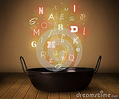 Glowing letters coming out from cooking pot Stock Photo
