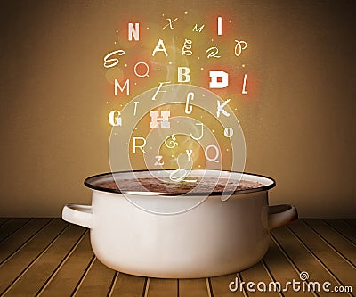 Glowing letters coming out from cooking pot Stock Photo