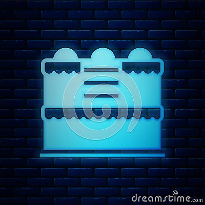 Glowing neon Cake icon isolated on brick wall background. Happy Birthday. Vector Vector Illustration