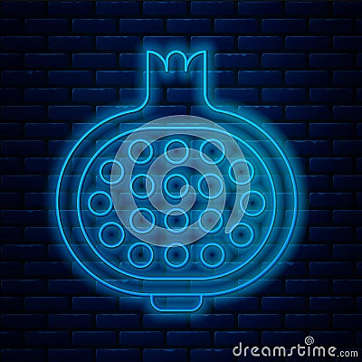 Glowing neon line Pomegranate icon isolated on brick wall background. Garnet fruit. Vector Vector Illustration