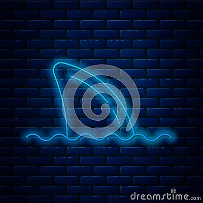 Glowing neon line Shark fin in ocean wave icon isolated on brick wall background. Vector Vector Illustration