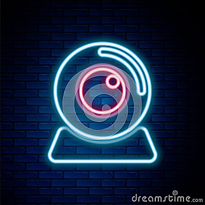 Glowing neon line Web camera icon isolated on brick wall background. Chat camera. Webcam icon. Colorful outline concept Vector Illustration