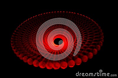 Glowing red light traces in form of disc on black Stock Photo