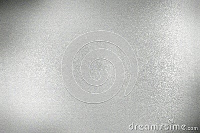 Glowing rough silver steel wall surface, abstract texture background Stock Photo