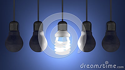 Glowing spiral light bulb among dead tungsten ones hanging on blue Stock Photo