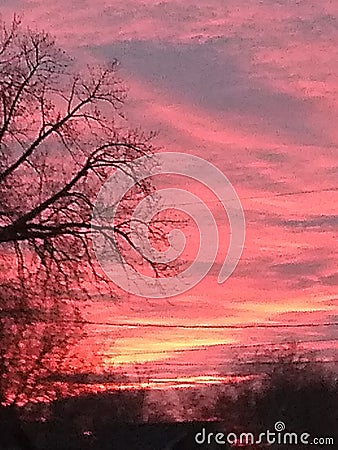 Glowing sunrise with clouds Stock Photo