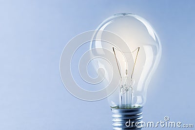 Glowing yellow light bulb, busienss idea concept Stock Photo