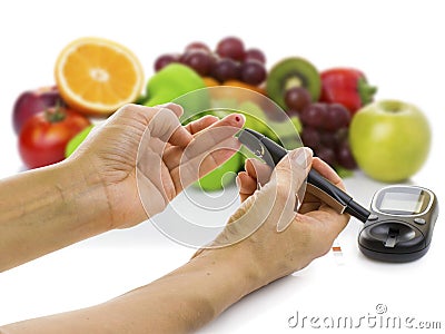 Glucometer for glucose level and healthy organic food Stock Photo