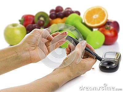 Glucometer for glucose level and healthy organic food Stock Photo