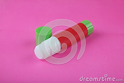 Glue Stick on Pink Stock Photo