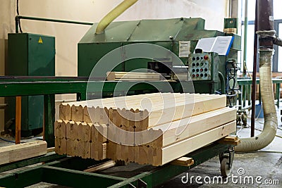 Glued pine timber beams in a woodworking factory Stock Photo
