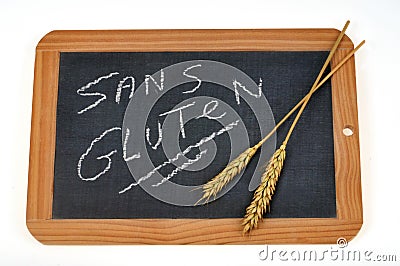 Gluten-free written in French on a school slate Stock Photo